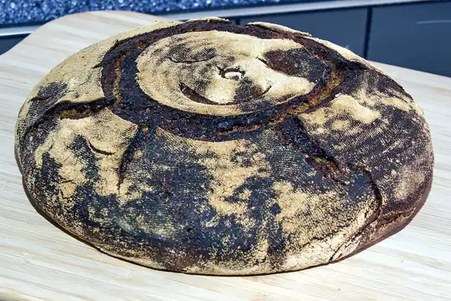 A freshly baked loaf of sourdough bread.