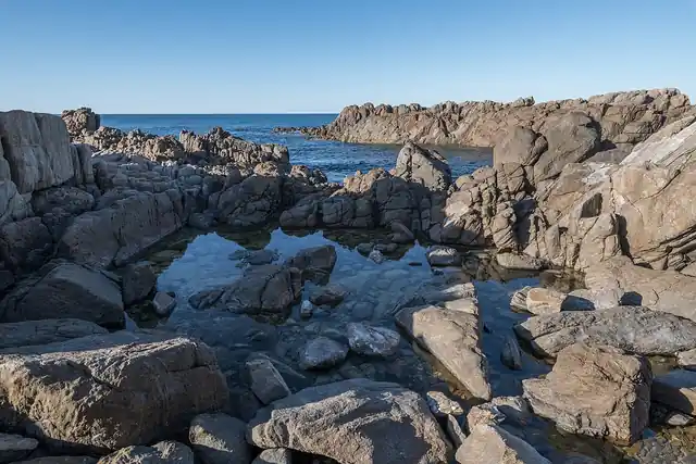A coastal rock pool at low tide.