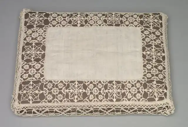 Bobbin lace around a linen centre.