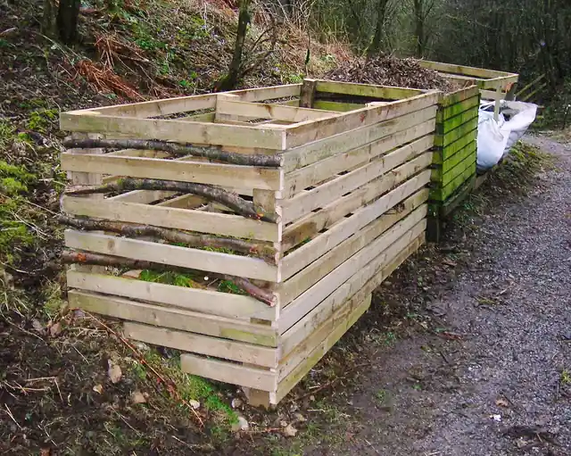 Outdoor bins used for composting garden material.