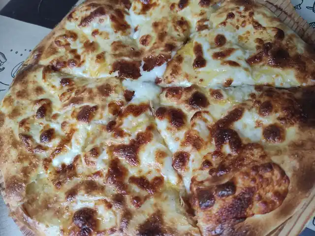Georgian khachapuri bread with a cheese filling.