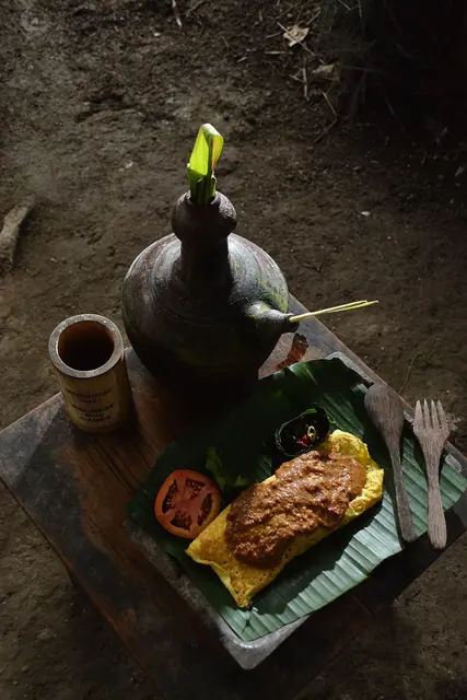 Indonesian fried rice with accompaniments.