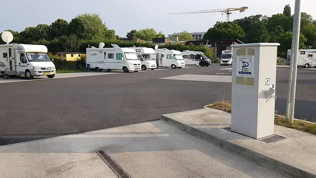 Motorhomes parked beside a service point at a motorhome stopover.