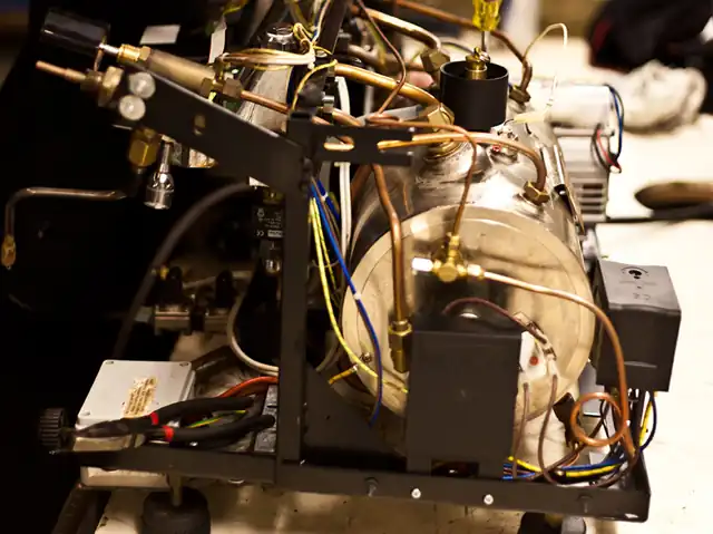 Pipes and wiring inside an espresso machine.