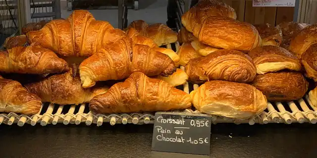 Golden croissants with flaky pastry layers.