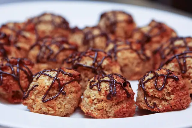 Coconut macaroons with lightly browned edges.