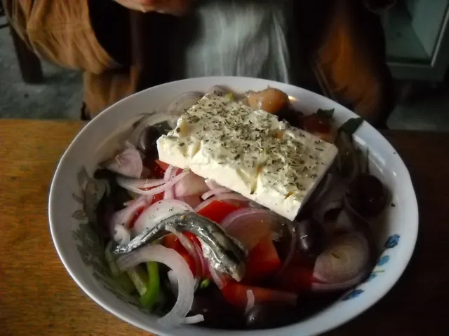 Greek salad with tomatoes, cucumber, olives and feta.