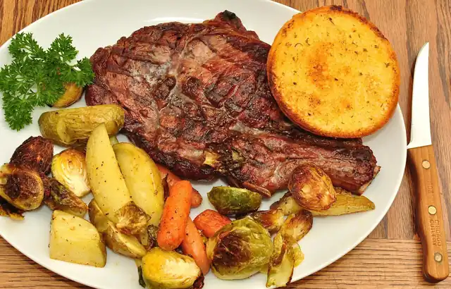 Grilled steak served on a plate.
