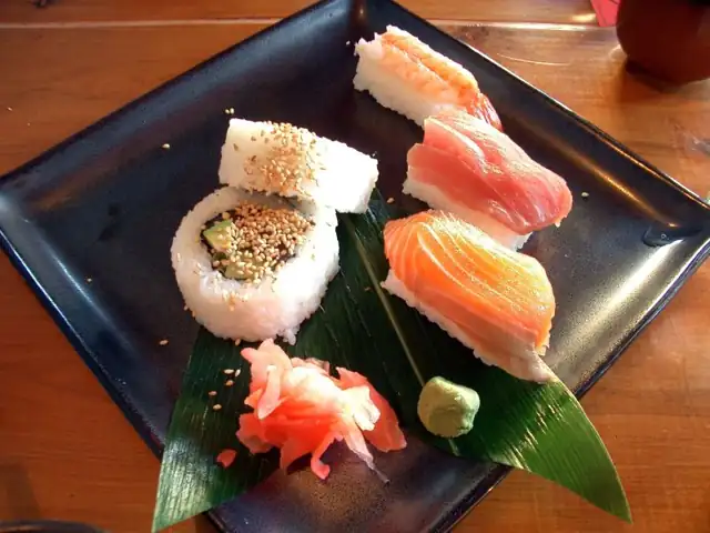 Sushi rolls and nigiri arranged on a platter.