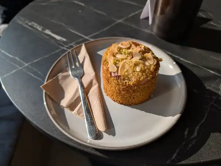 A gluten-free pistachio and raspberry friand.