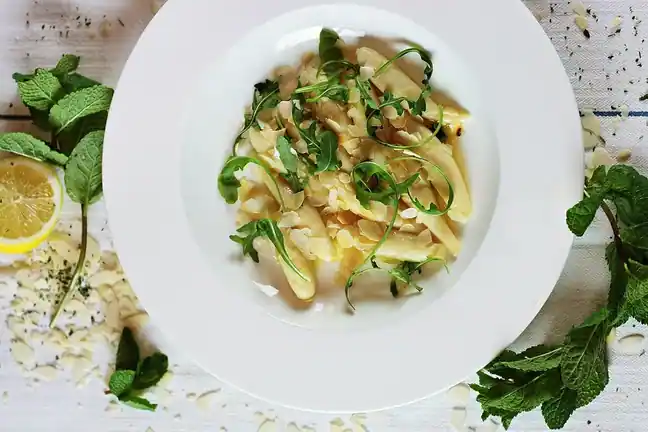 Gluten-free gnocchi served with vegetables.