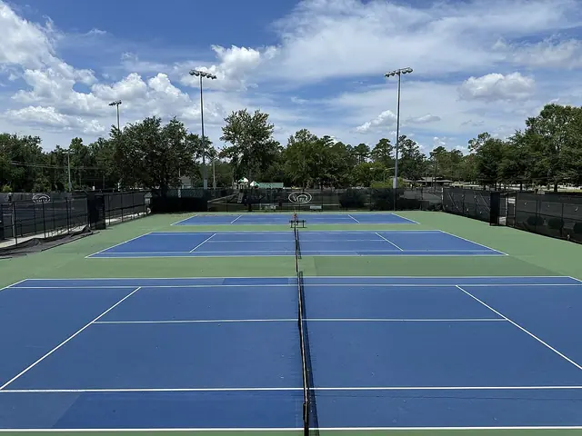 A tennis court ready for a game.