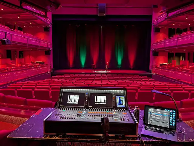 Rows of seats facing a theatre stage.