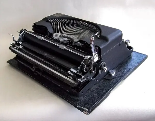 A portable mechanical typewriter.