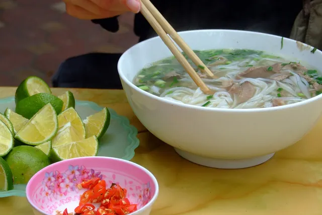 Vietnamese noodle soup with herbs.