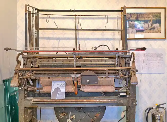 Threads arranged on a hand loom.