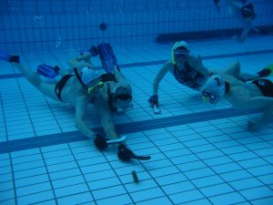 Underwater field hockey